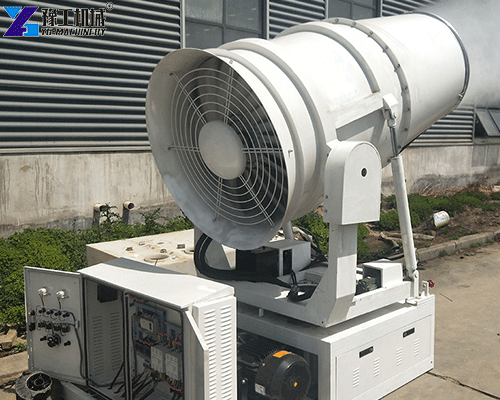 Industrial fog cannon used for dust control in a mining and material handling area